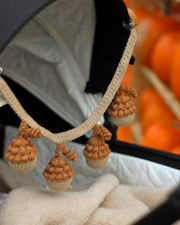Patti Oslo Acorn Pram Chain | caramel Music Mobiles & Pram Chains